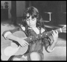 Susanna Hoffs and her guitar