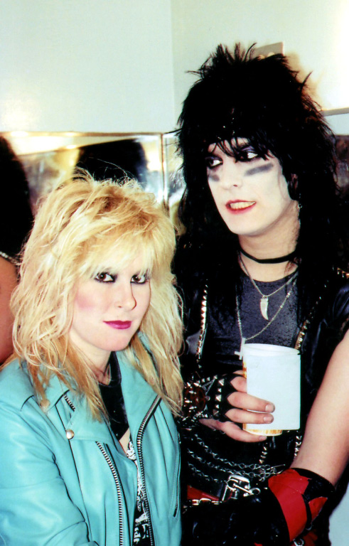 Classic photo of Lita and Nikki Sixx by Jack Lue, Legendary Rock Interviews, Living Like A Runaway features Nikki
