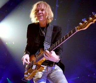 Aerosmith Bassist Tom Hamilton On New Blu-Ray/DVD Release, Band’s Copacetic Chemistry And Obscene Plush Toys